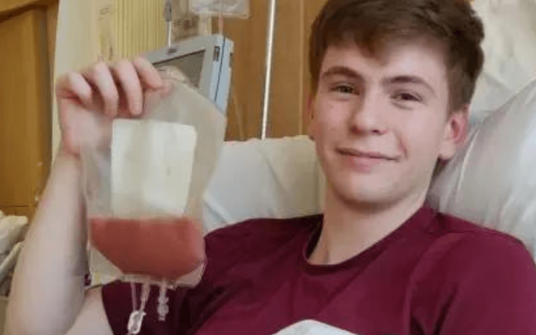 Callum Kennedy-Mann holding IV bag